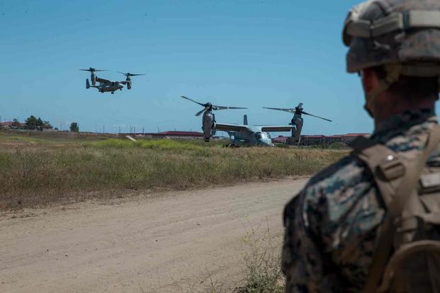 U.S. Marine Corps MV-22B Ospreys land during a helicopter raid course.