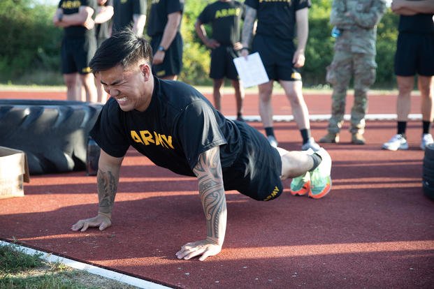 U.S. Army Soldier Spc. Brian Rivera of the 4th Squadron, 2nd Cavalry Regiment, executes a hand-release push-up during the Army Combat Fitness Test held during Victory Corps’ Best Squad Competition at Grafenwöhr, Germany.