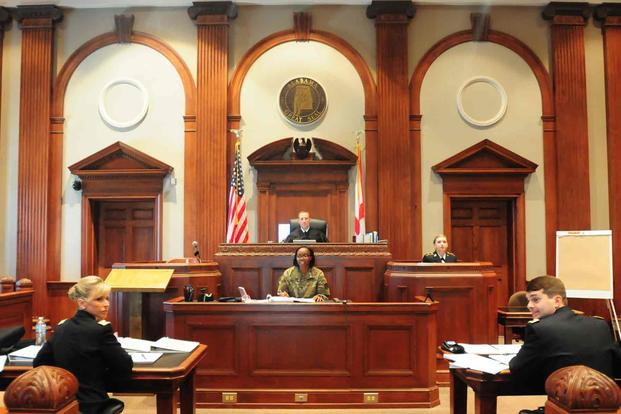 Members of the Judge Advocate General Corps complete a mock court martial