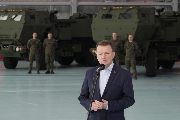 Poland's Defense Minister Mariusz Blaszczak speaks during a ceremony