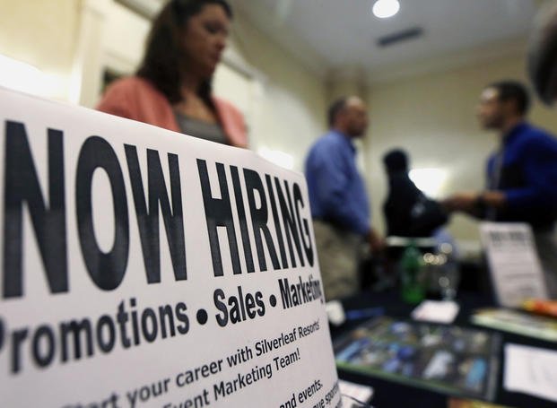 sign attracts job-seekers during a job fair