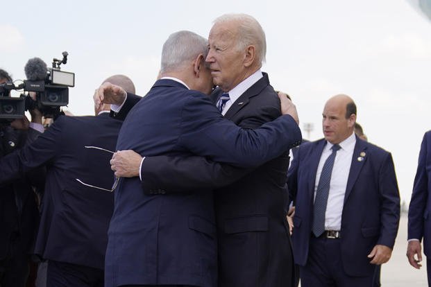 President Joe Biden is greeted by Israeli Prime Minister Benjamin Netanyahu
