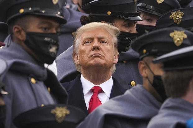 President Donald Trump watches the first half of the 121st Army-Navy Football Game