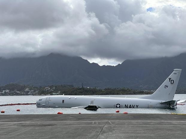 Navy P-8A plane that overshot a runway at Marine Corps Base Hawaii and landed in shallow water offshore