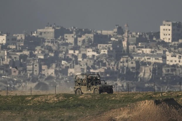 Israeli soldiers are seen along the Israeli-Gaza border, southern Israel.