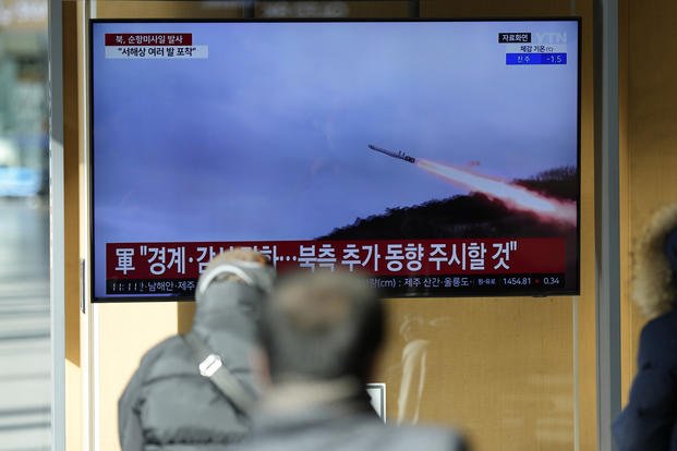 North Korea's cruise missiles with file footage during a news program