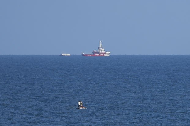 A ship belonging to the Open Arms aid group approaches the shores of Gaza.
