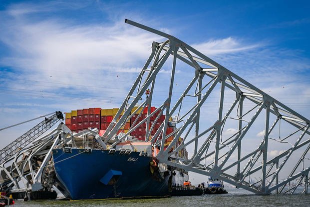 Salvage efforts continue as workers make preparations to remove the wreckage of the Francis Scott Key Bridge