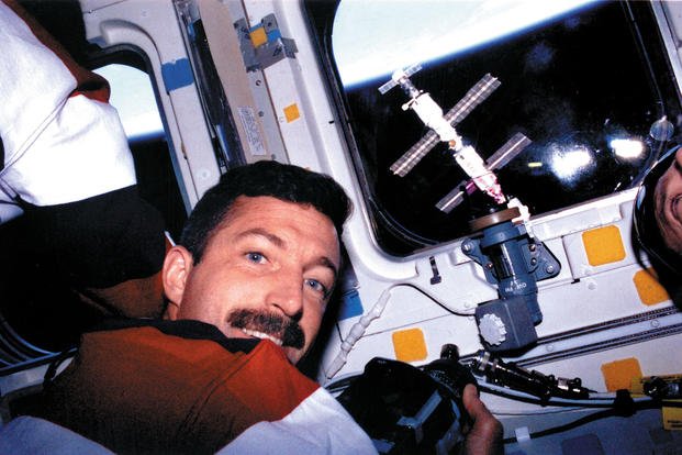 Coast Guard Lt. Cmdr. Daniel Burbank, the Coast Guard's 2nd  officer to become a NASA astronaut, traveled into space for mission STS-106 in September 2000. 