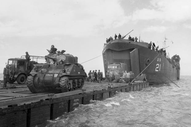 The British tank Virgin lands at Normandy on D-Day. 