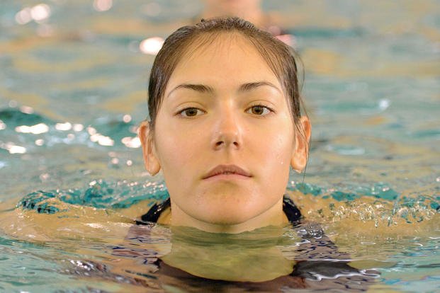 A recruit from Papa Company 189 treads water for 5 minutes during her swim assessment at Training Center Cape May, N.J., April 3, 2014. 
