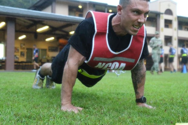 Spc. Patrick J. Saladino, 23rd Chemical Battalion, 2nd Sustainment Brigade, 2nd Infantry Division/ROK-US Combined Division, conducts push-ups during an Army Physical Fitness Test on Day 1 of the Pacific Theater Best Warrior Competition at Schofield Barracks, Hawaii. 