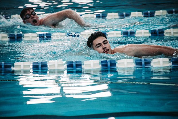 U.S. Marines with 8th Engineer Support Battalion, Combat Logistics Regiment 27, 2nd Marine Logistics Group conduct a 500-meter swim during a littoral engineer reconnaissance team (LERT) screening swim qualification on Camp Lejeune, North Carolina.