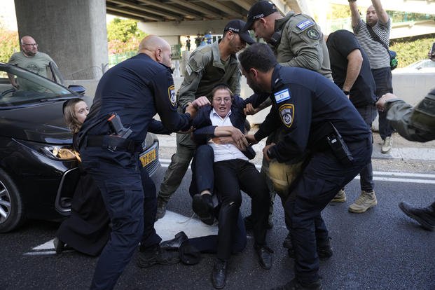 Ultra-Orthodox Jewish youth protest military recruitment near Tel Aviv