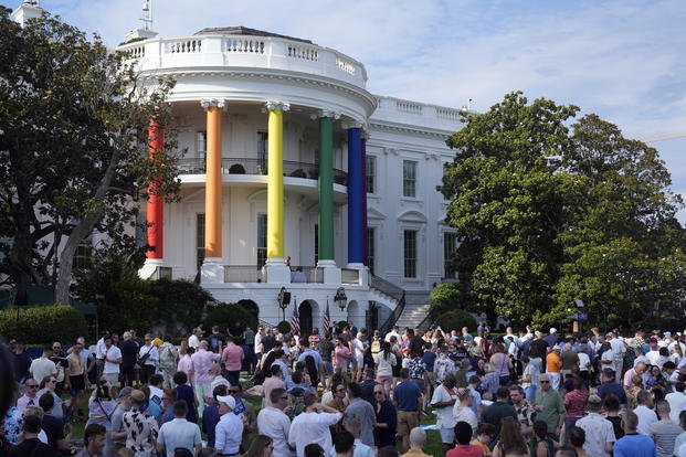 People arrive before first lady Jill Biden speaks at a Pride Month celebration on the South Lawn of the White House