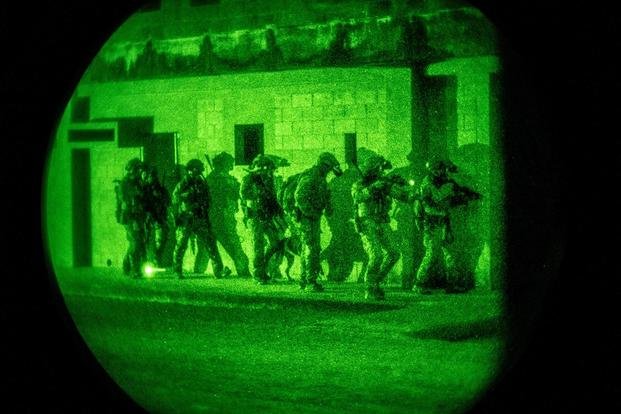 Nighttime helicopter assault force raid training mission in Okinawa