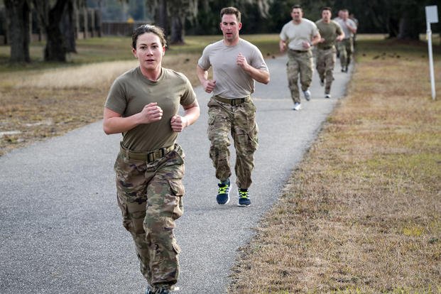 Airmen run the 2-mile portion of the Army Physical Fitness Test as part of an Army Air Assault Assessment on Jan. 30, 2019, at Camp Blanding, Fla. 