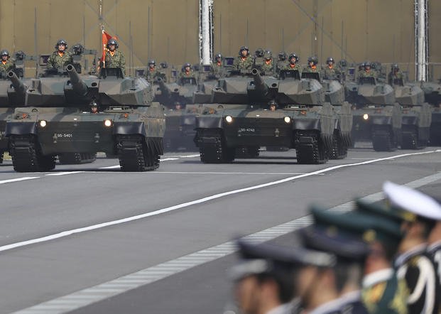 The Japan Ground Self-Defense Force tanks parade in Japan. 