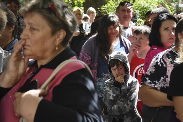 People evacuated from fighting between Russian and Ukrainian forces 