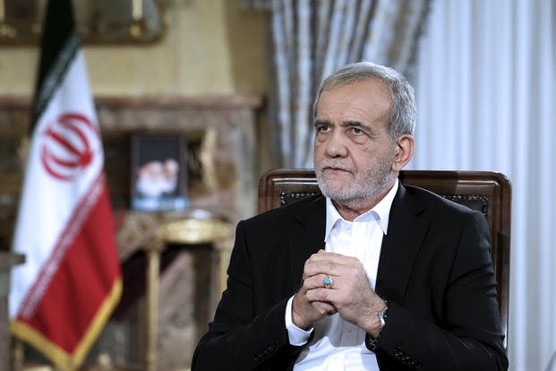  President Masoud Pezeshkian speaks in a live televised interview by state TV