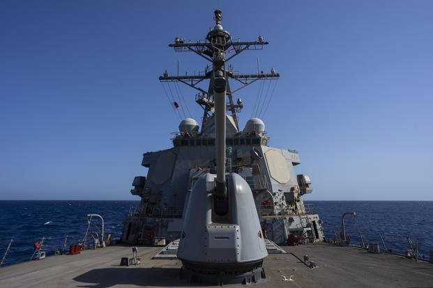 The Arleigh Burke-class guided missile destroyer USS Laboon sails in the Red Sea