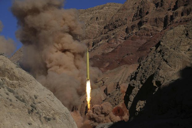 A Qadr H long-range ballistic surface-to-surface missile is fired by Iran's Revolutionary Guard