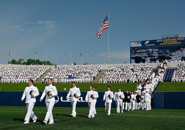 The procession of graduating midshipmen at the Naval Academy.