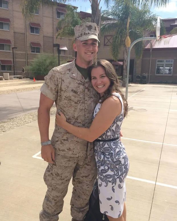 Taylor greets her husband, Conor Hobbs, a first lieutenant at the time, at Camp Pendleton