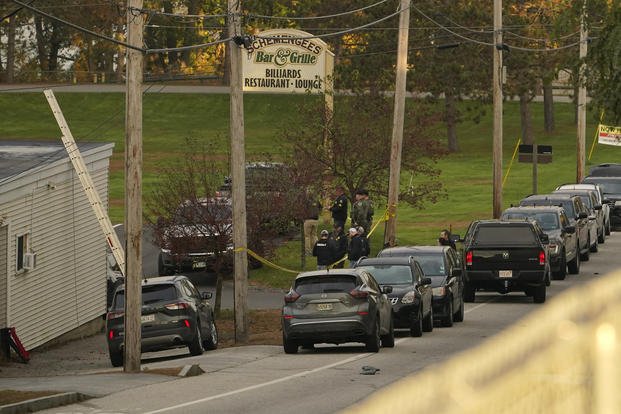 Law enforcement gather outside Schemengee's Bar and Grille