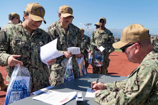 Souda Bay chaplain , instructs sailors about how to vote 