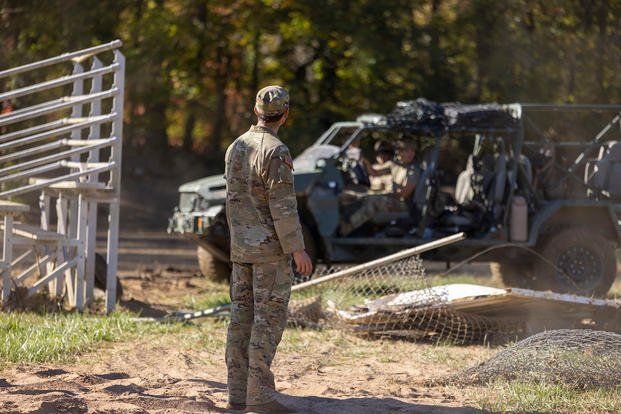 Soldier removes debris in Swannanoa, North Carolina