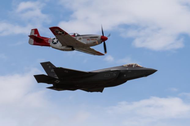 A P-51 Mustang flies in formation with U.S. Air Force Capt. Kristin "BEO" Wolfe, the F-35A Demonstration Team pilot, during a heritage flight practice June 16, 2020, Hill Air Force Base, Utah.