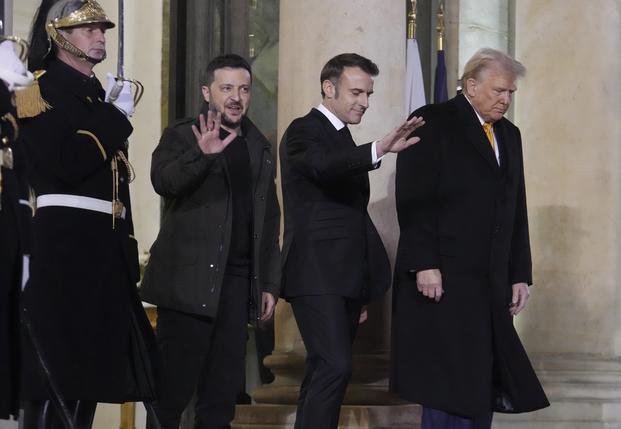French President Emmanuel Macron, center, President-elect Donald Trump