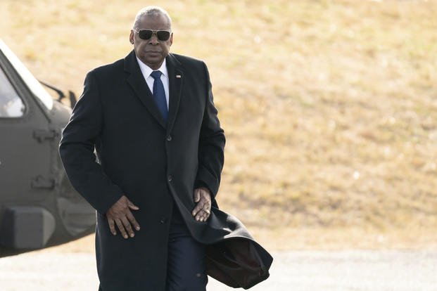 U.S. Defense Secretary Lloyd Austin arrives at Camp Asaka, a Japan Ground Self-Defense Force base, on the outskirts of Tokyo