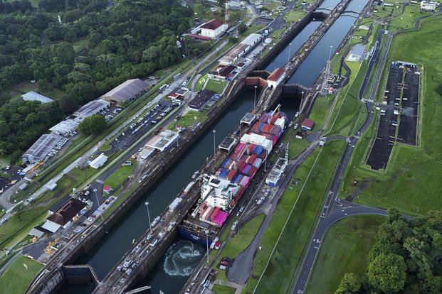 A cargo ship traverses the Agua Clara Locks of the Panama Canal in Colon, Panama