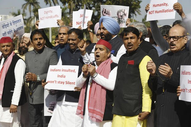 India's opposition lawmakers protest outside the Parliament in New Delhi