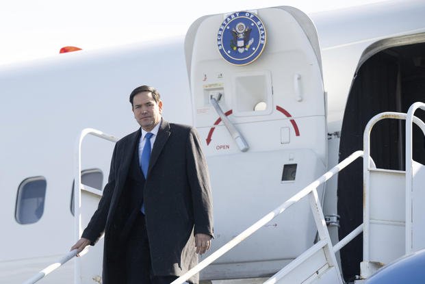 U.S. Secretary of State Marco Rubio disembarks from a military airplane