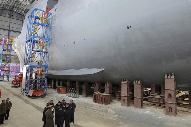 North Korean leader Kim Jong Un visits a shipyard.