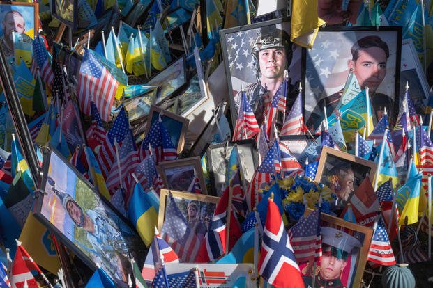 makeshift memorial for the fallen Ukrainian and foreign fighters