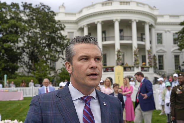 Defense Secretary Pete Hegseth speaks on the South Lawn of the White House