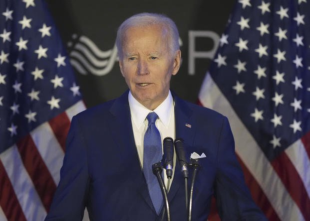 Former President Joe Biden speaks at a conference in Chicago.