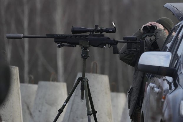 A Polish soldier at Poland's border with Russia, in Dabrowka, Poland