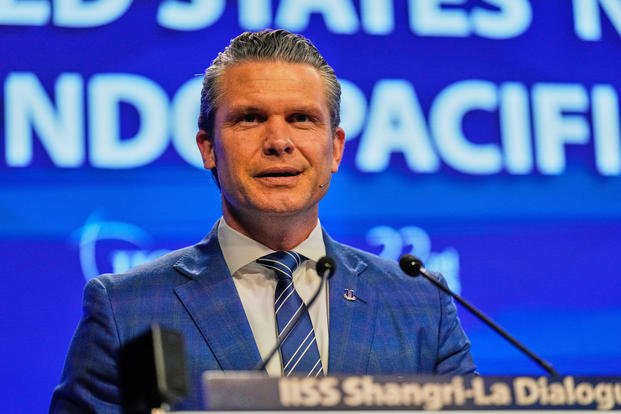 U.S. Defense Secretary Pete Hegseth delivers a speech.