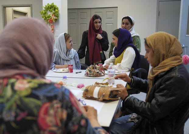 A group of female Afghan refugees gather for a class on self-care and a post-Ramadan celebration