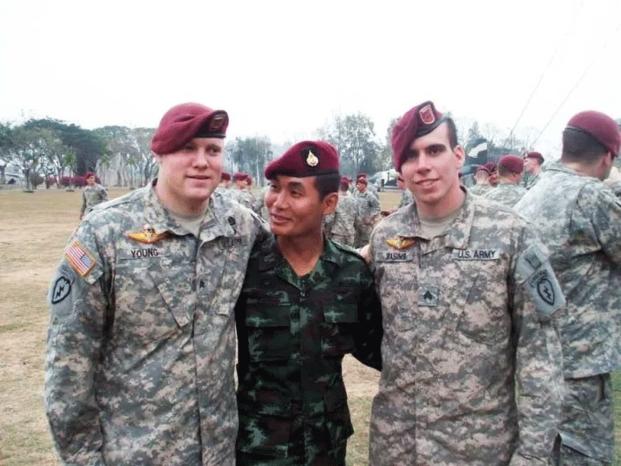 The author, right, with his team leader and a Thai paratrooper in Thailand. (Photo courtesy of Kevin Rasins)