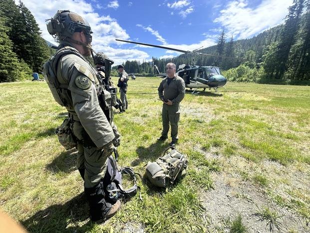 deputies participate in the search for Travis Decker, at an undisclosed location in Washington state