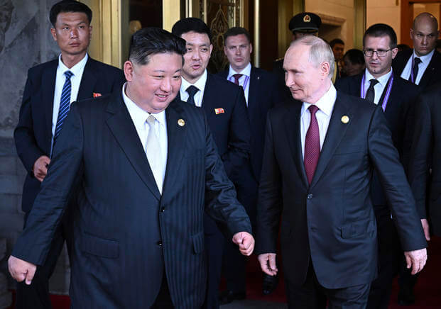 Russian President Vladimir Putin, right, and North Korean leader Kim Jong Un