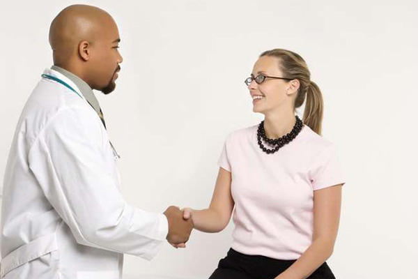 Doctor Greets A Patient With A Handshake Military Com Doctor Greets A Patient With A Handshake Military Com