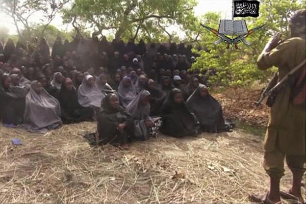 In this photo taken from video by Nigeria's Boko Haram terrorist network, Monday May 12, 2014 shows the alleged missing girls abducted from the northeastern town of Chibok. (AP Photo)