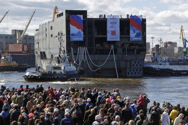 The stern of Sevastopol, a Mistral class, amphibious assault ship is launched at St.Petersburg naval shipyard on Wednesday, April 30, 2014. (AP Photo/Dmitry Lovetsky)